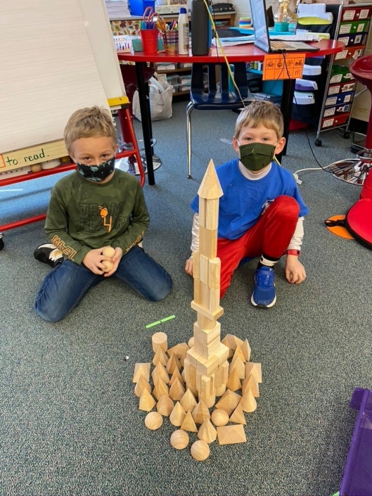 kids and tower